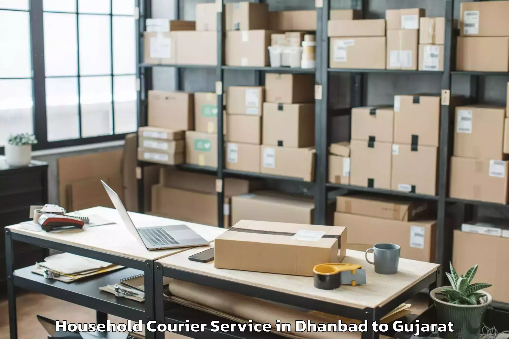 Leading Dhanbad to Madhavkampa Household Courier Provider